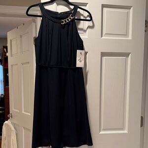 Ivanka Trump Black Dress with Gold Chain Detail
